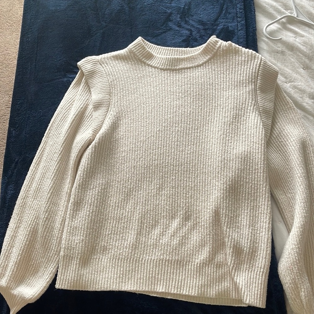 White sweater with ruffle sleeve